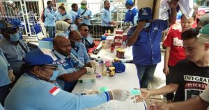 Pertama di Indonesia, DPD Demokrat Papua Turun Jalan Bagi Masker Gratis