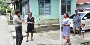 Satgas Aman Nusa II Polda Papua Sosialisasi Pencegahan Corona