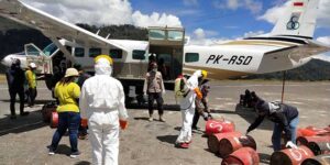 TNI-Polri Semprot Cairan Disinfektan di Bandara Sugapa