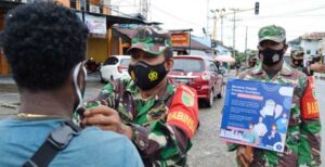 Kodim Mimika Bagikan 1500 Masker Gratis