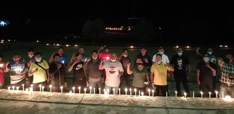 Aksi Bakar Lilin Dukung PI 10 Persen Maslea Kor