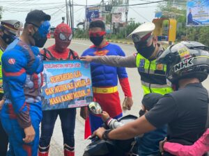 Captain America Cs Ikut Sosialisasi Protkes Berlalu Lintas di Kota Jayapura 2 WhatsApp Image 2021 04 17 at 19.59.331