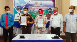 Pemkab Bursel – Kejari Buru Teken MoU Bidang Perdata dan TUN