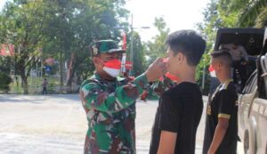 Aksi Bagi-bagi Masker Merah Putih Warnai Peringatan HUT RI di Kota Jayapura