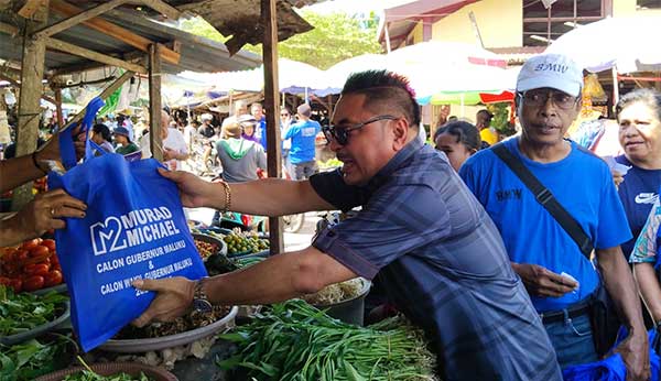 MM BMW Berbagi kasih di Pasar Transit Passo