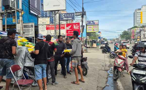 Ditreskrimsus Polda Papua Gelar Gerakan Pangan Murah di Kota Jayapura 1 Ditreskrimum Polda Papua Gerakan Pangan Murah