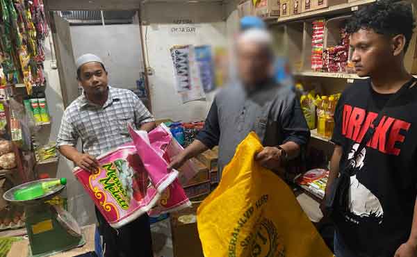 Polisi Tangkap Pelaku Oplos Beras di Kasonaweja, Karung Dikirim dari Biak 2 Pelaku Oplos Beras di Kasonaweja2