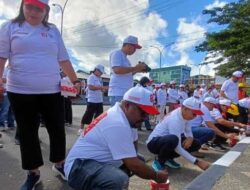 BPJN Maluku Sambut HUT ke 81 RI: Bersihkan-Cat Kerb Jalan Nasional di Ambon