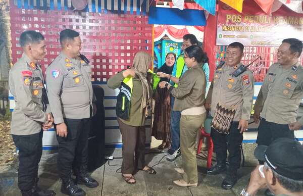 Kadistrik Merlyn Ajak Warga Mimika Baru Aktif Jaga Keamanan Lewat Pos Peka 1 IMG 20260830 WA00062